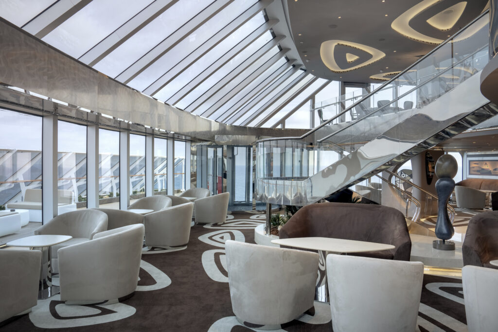MSC Yacht Club experience Top Sail Lounge with panoramic ocean views and private luxury seating